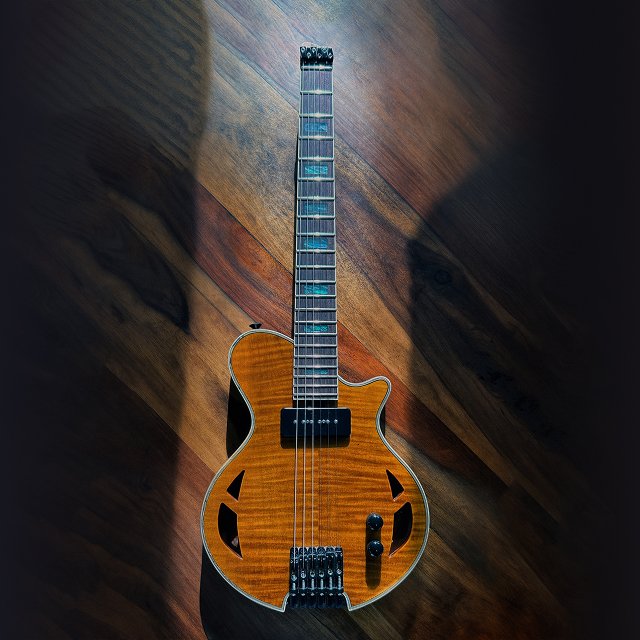 PACE Headless Semi-Hollow Travel Guitar — ergonomic acoustic-electric guitar designed and built for portability and comfort, industrial design portfolio thumbnail by Diego Báez
